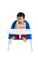 Portrait of a cute baby sitting in chair for eat. Isolated on white background with copy space