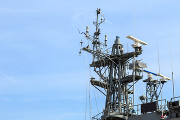 Radar of warship at the harbor in Thailand on blue sky