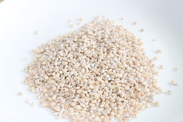 Close up cereal on white plate.