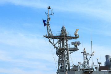 Radar of warship at the harbor in Thailand on blue sky