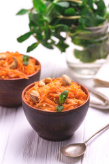 Indian carrot Gajar halwa. Copyspace, horizontal view.