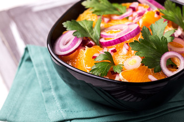 Italian Sicilian orange salad with onion, parsley. Copyspace, horizontal view.