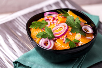 Italian Sicilian orange salad with onion, parsley. Copyspace, horizontal view.