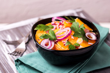Italian Sicilian orange salad with onion, parsley. Copyspace, horizontal view.