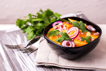 Italian Sicilian orange salad with onion, parsley. Copyspace, horizontal view.
