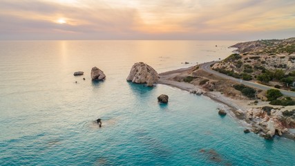 Aerial Bird's eye view of Petra tou Romiou, aka Aphrodite's rock a famous tourist travel...