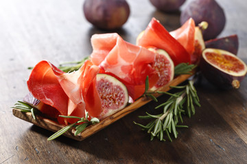 Prosciutto with figs and rosemary.
