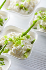 Cottage cheese with green onions.