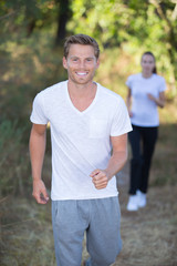 couple jogging and running outdoors