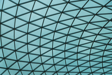 Abstract pattern of glass and steel like a spider web.