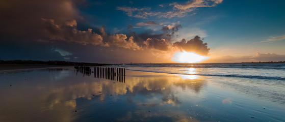 Storm Clouds at sunset over West Wittering Beach, West Sussex, UK