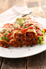 canneloni with beef and tomato sauce