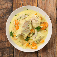 fish cooked with cream, carrot and curcuma