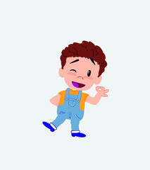 White boy in jeans doing the OK sign with his hand.