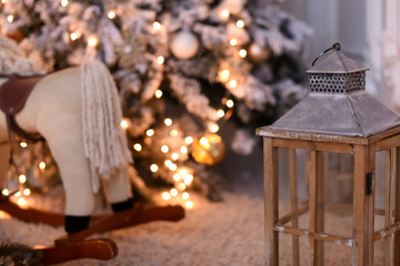 Christmas interior of a living room with a candlestick