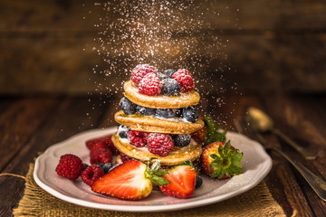 Obraz na płótnie Canvas Pancakes with berries 