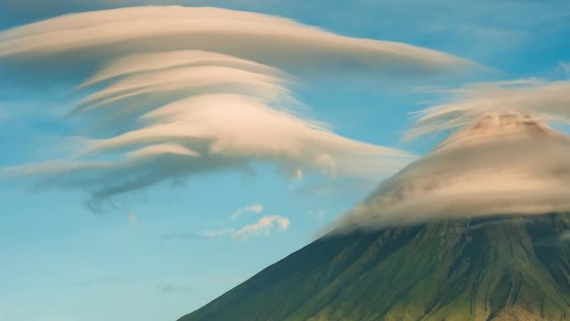 Mayon Volcano with the ventricular of clouds. TimeLapse in sunrise. Active stratovolcano in the province of Albay in Bicol Region, on the island of Luzon in the Philippines.