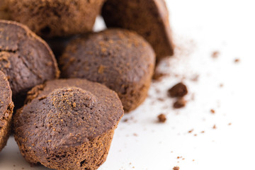 Chocolate muffins home baked cupcakes on white background