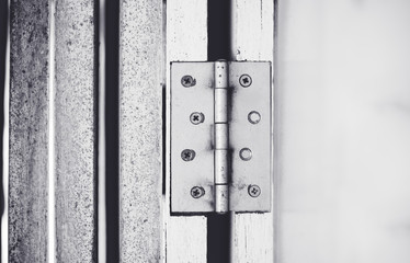 Close up Hinges on the door.Black and white tone.