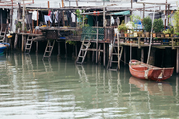 Fototapeta na wymiar Tai o fishing village, Old floating house and sea in HongKong