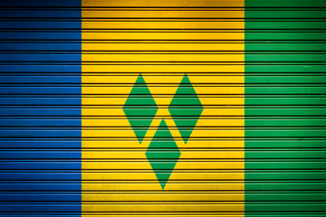 Saint Vincent and the Grenadines Caribbean Flag sign in iron garage door texture, flag background