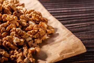 Walnut on a dark rustic wooden background