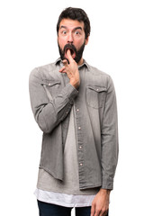 Fototapeta premium Handsome man with beard making suicide gesture on white background