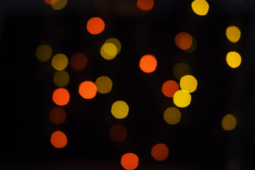 colorful blured bokeh growing in the dark