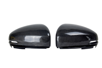Mirror housing make by carbon fiber on isolate background