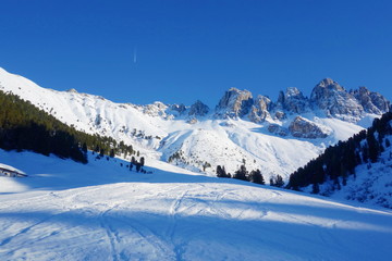 Fototapeta na wymiar Kalkkoegel mountains snowy panorama during winter in Kemater Alm, near Innsbruck, Tirol, Alps, Austria