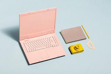 Minimal pastel workspace equipment.