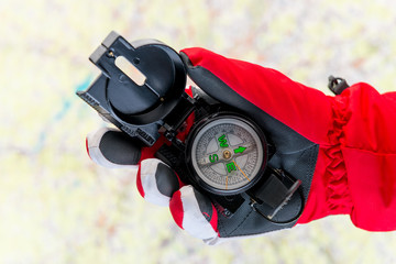 conceptual photo - search for missing tourists in the mountains in winter - a hand in the glove...