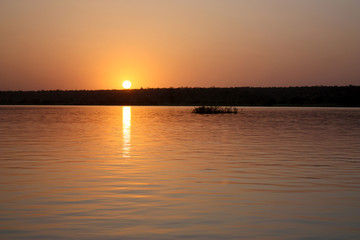 sunset on the river niger
