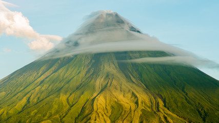 Mayon Volcano is an active stratovolcano in the province of Albay in Bicol Region, on the island of Luzon in the Philippines. Renowned as the perfect cone because of its symmetric conical shape.