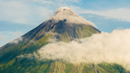 Fototapeta premium Mayon Volcano is an active stratovolcano in the province of Albay in Bicol Region, on the island of Luzon in the Philippines. Renowned as the perfect cone because of its symmetric conical shape.