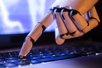 Robot Typing On Laptop