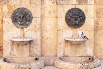 Old fountains in historic center of Tarragona,Spain.