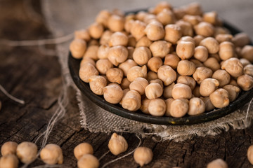 Organic chickpea on wooden  background