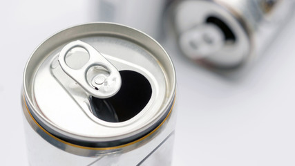 Close up of aluminum cans on a top view.