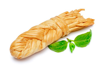 Smoked braided cheese on white background