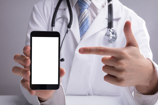Doctor Showing Blank White Mobile Screen