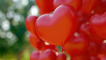 red hearts balloons over blue sky. Love, valentines day, romantic, wadding or birthday background