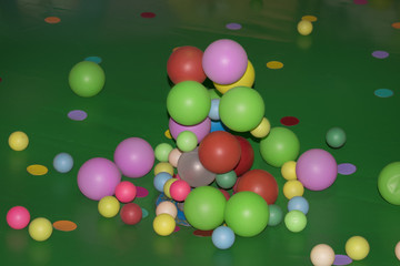 Colorful rainbow dragée balls background. Children's toy of balls.