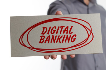 The concept of business, technology, the Internet and the network. Young businessman showing inscription: Digital banking