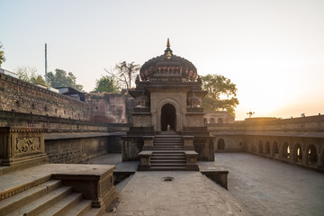 Shiva Lingam temple at Maheshwar, India. Architectural details of stone carvings.