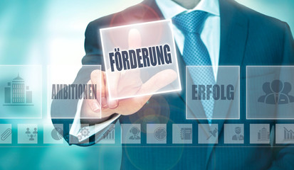 A businessman pressing a Promotion 