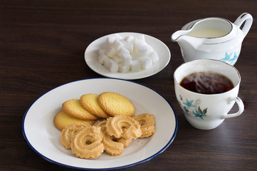 English tea and Cookies on brown wooden table