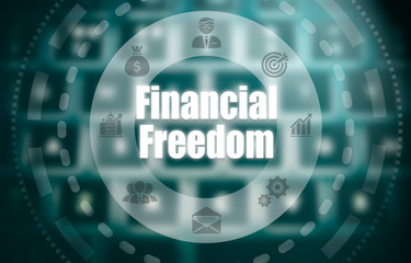 A financial freedom concept on a futuristic computer display over a blured image of a keyboard.