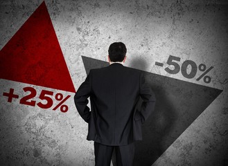 Businessman looking at statistics