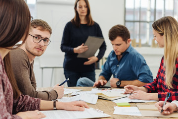 Group of young businesspeople in a meeting